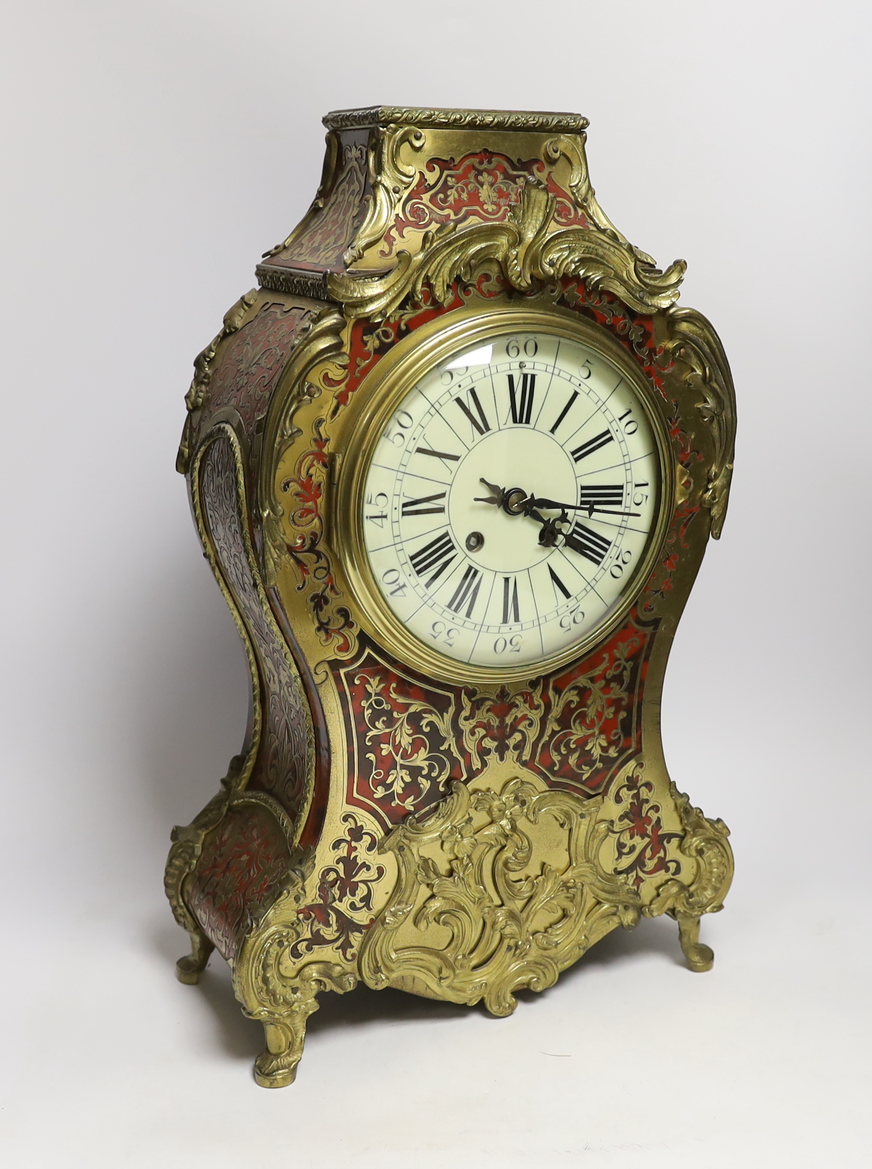 A large 19th century Louis XV style red Boulle work eight day mantel clock